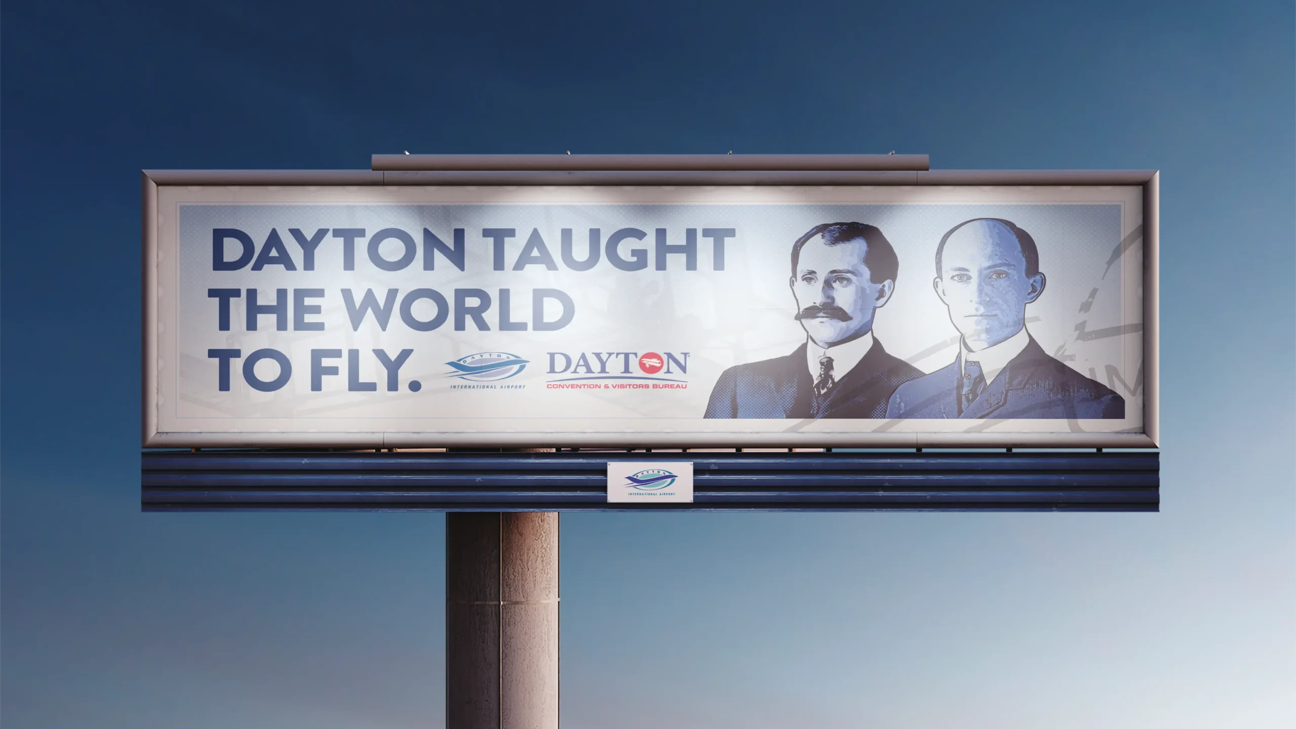 Billboard for Dayton International Airport with the writing "Dayton taught the world to fly" and a picture of Orville and Wilbur Wright